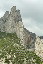 Photo of Picturesque landscape with high mountains under gloomy sky