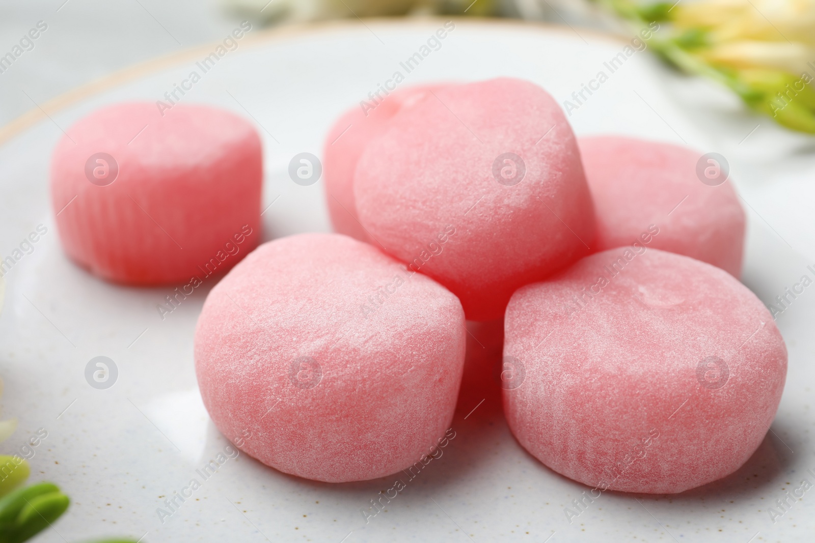 Photo of Delicious mochi on plate, closeup. Traditional Japanese dessert