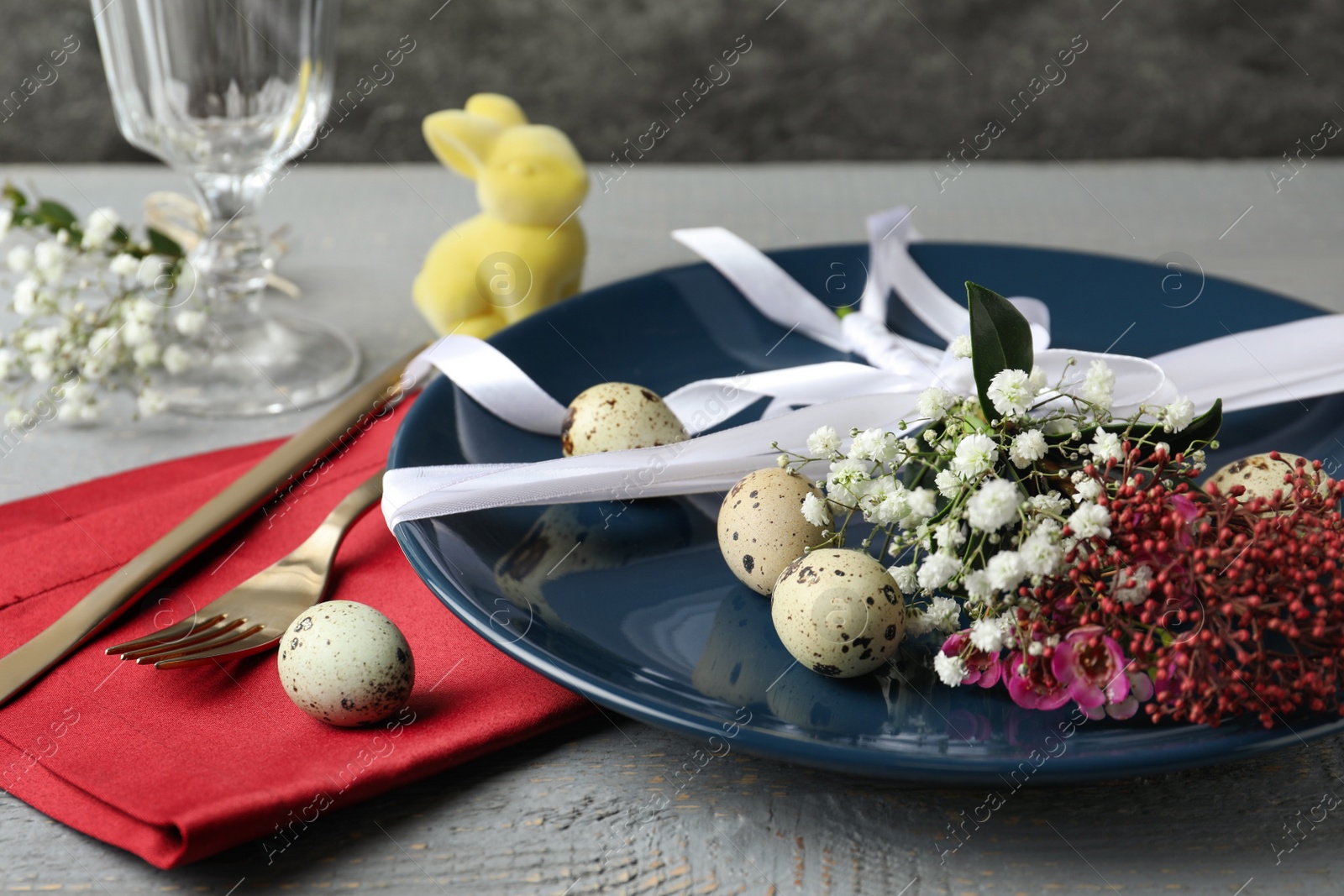 Photo of Festive Easter table setting with beautiful floral decor