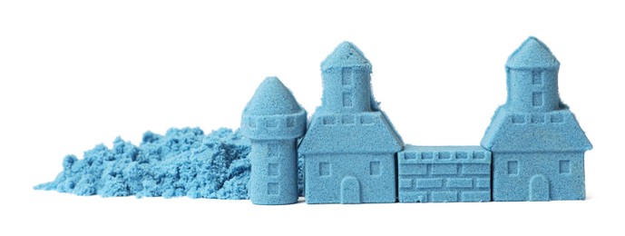 Castle made of blue kinetic sand isolated on white