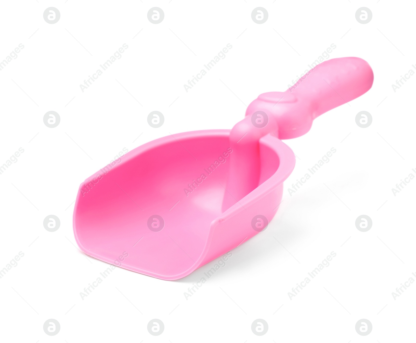 Photo of Pink plastic toy shovel isolated on white