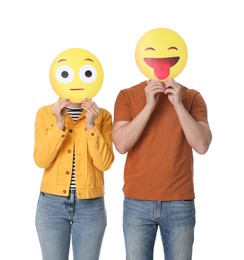 Photo of People covering faces with emoticons on white background