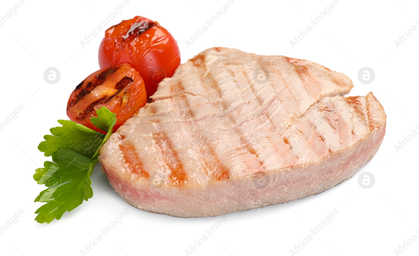 Photo of Delicious tuna steak with parsley and tomatoes isolated on white