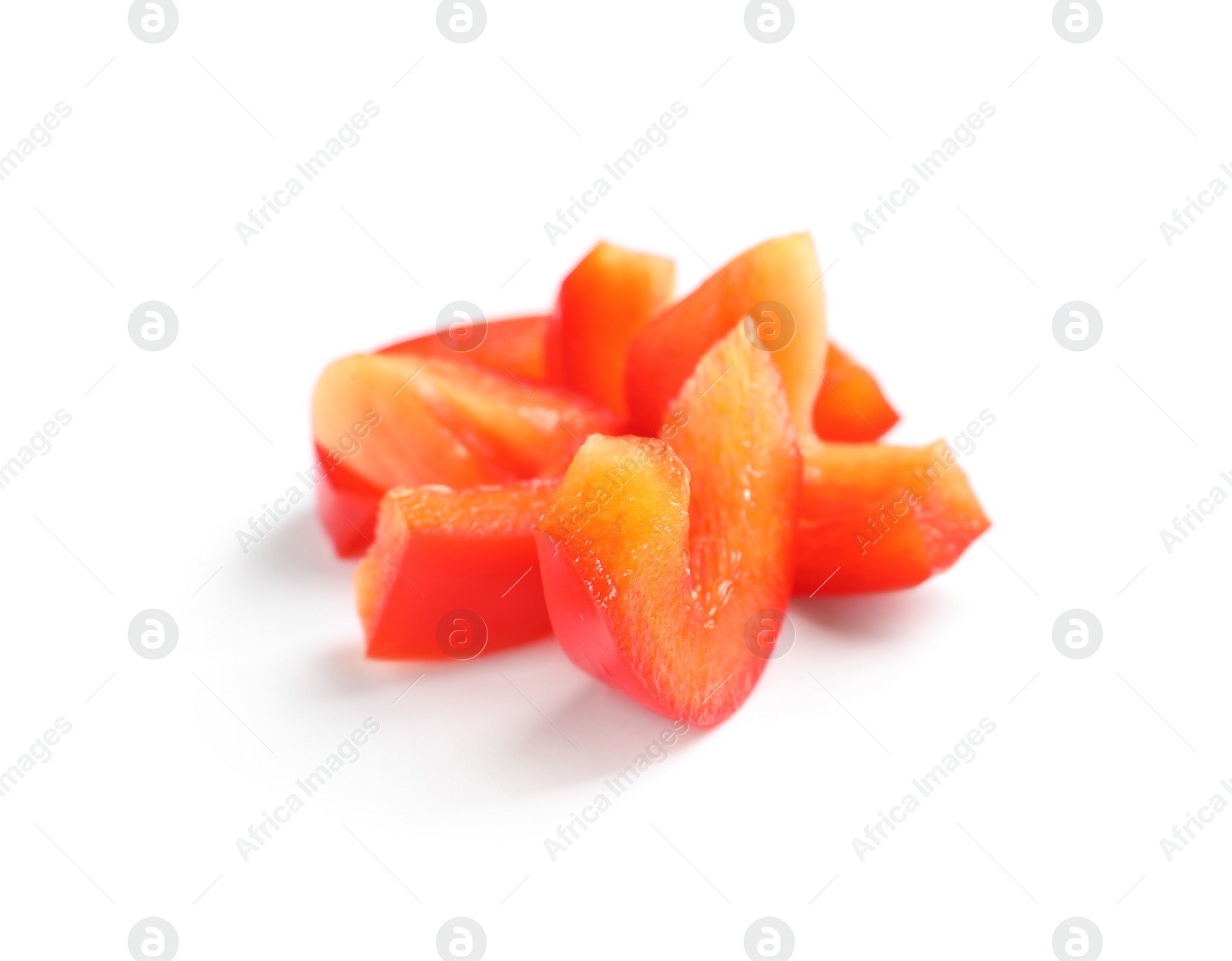 Photo of Slices of ripe red bell pepper on white background