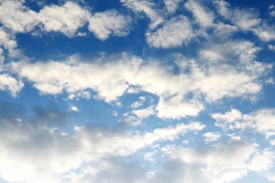 Photo of Picturesque view of beautiful fluffy clouds in light blue sky