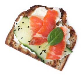 Delicious sandwich with cream cheese, salmon, cucumber and spinach isolated on white, top view