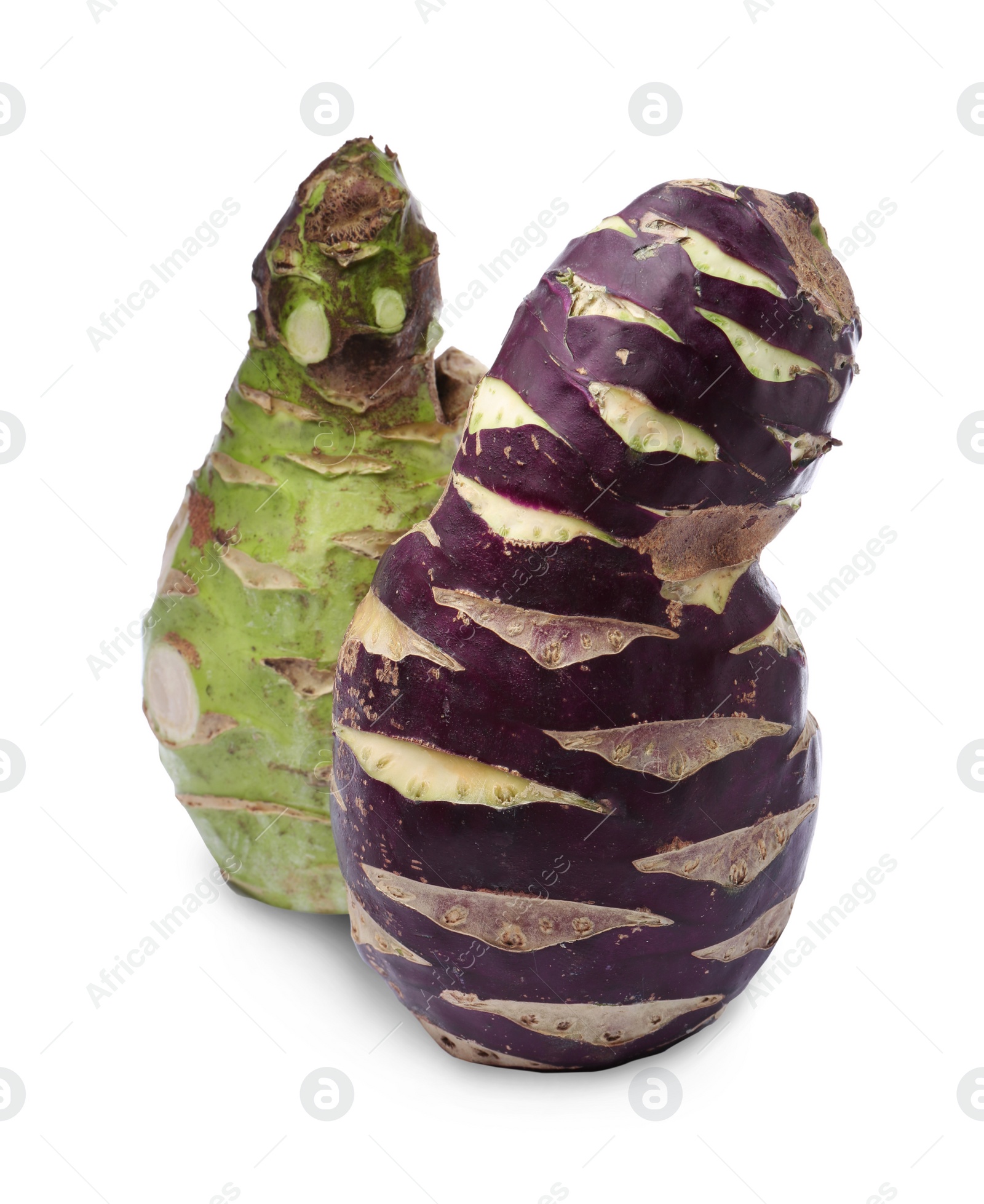 Photo of Tasty purple and green Kohlrabi cabbages on white background