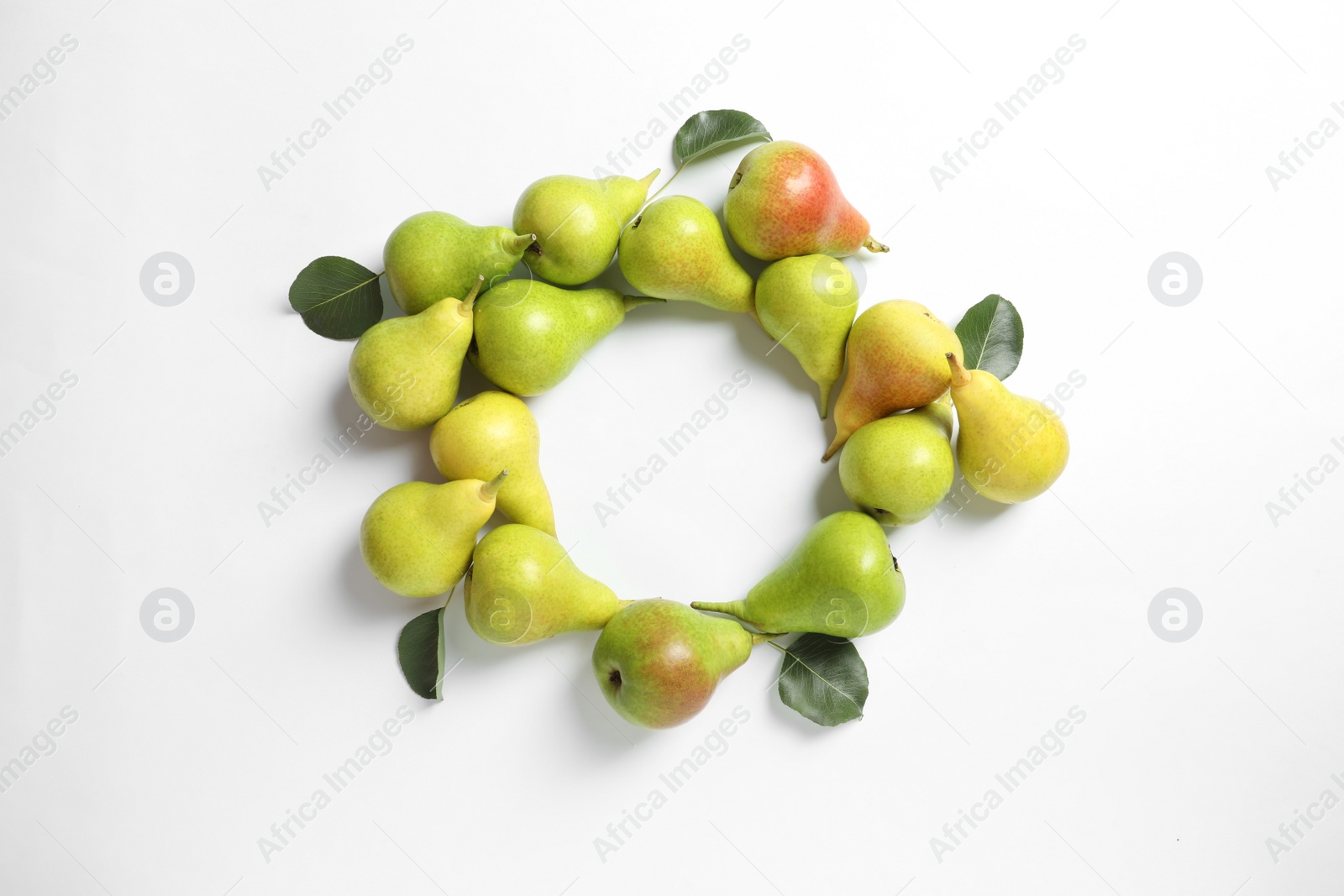 Photo of Frame made of ripe juicy pears on white background, top view