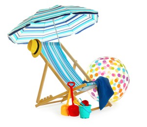 Beach umbrella, deck chair, inflatable ball, hat, towel and child's sand toys on white background