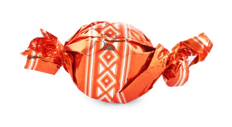 Candy in orange wrapper isolated on white