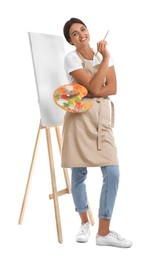 Photo of Young woman with drawing tools near easel on white background