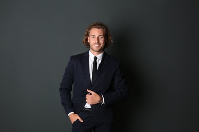 Portrait of handsome man on dark background