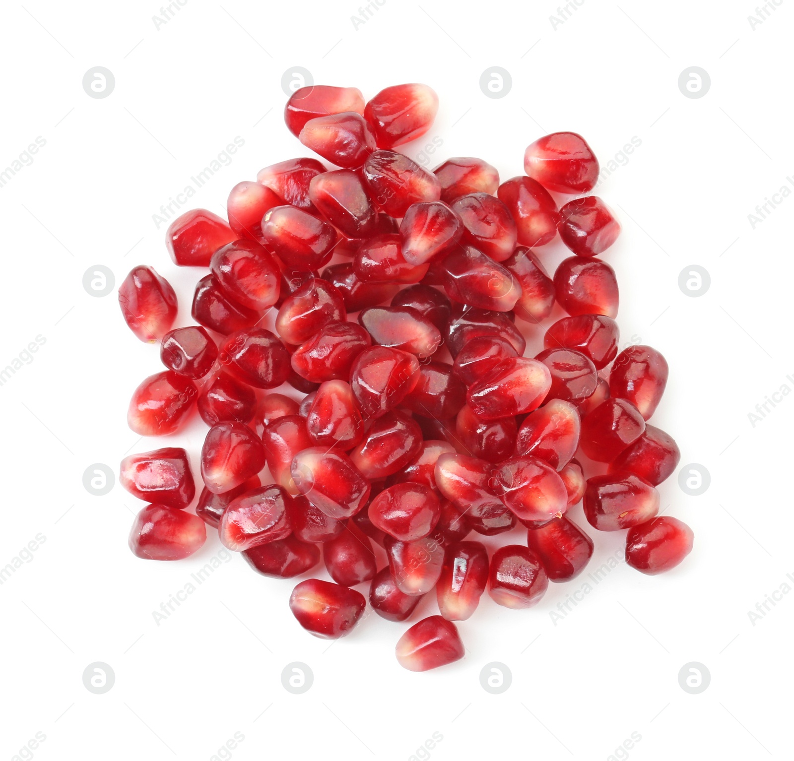 Photo of Pile of tasty pomegranate grains isolated on white, top view