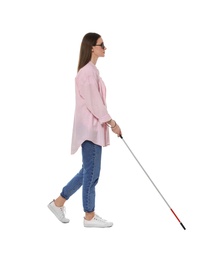 Photo of Blind woman with long cane on white background