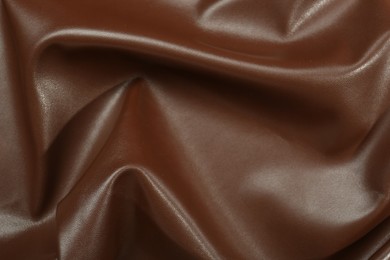 Brown natural leather as background, top view