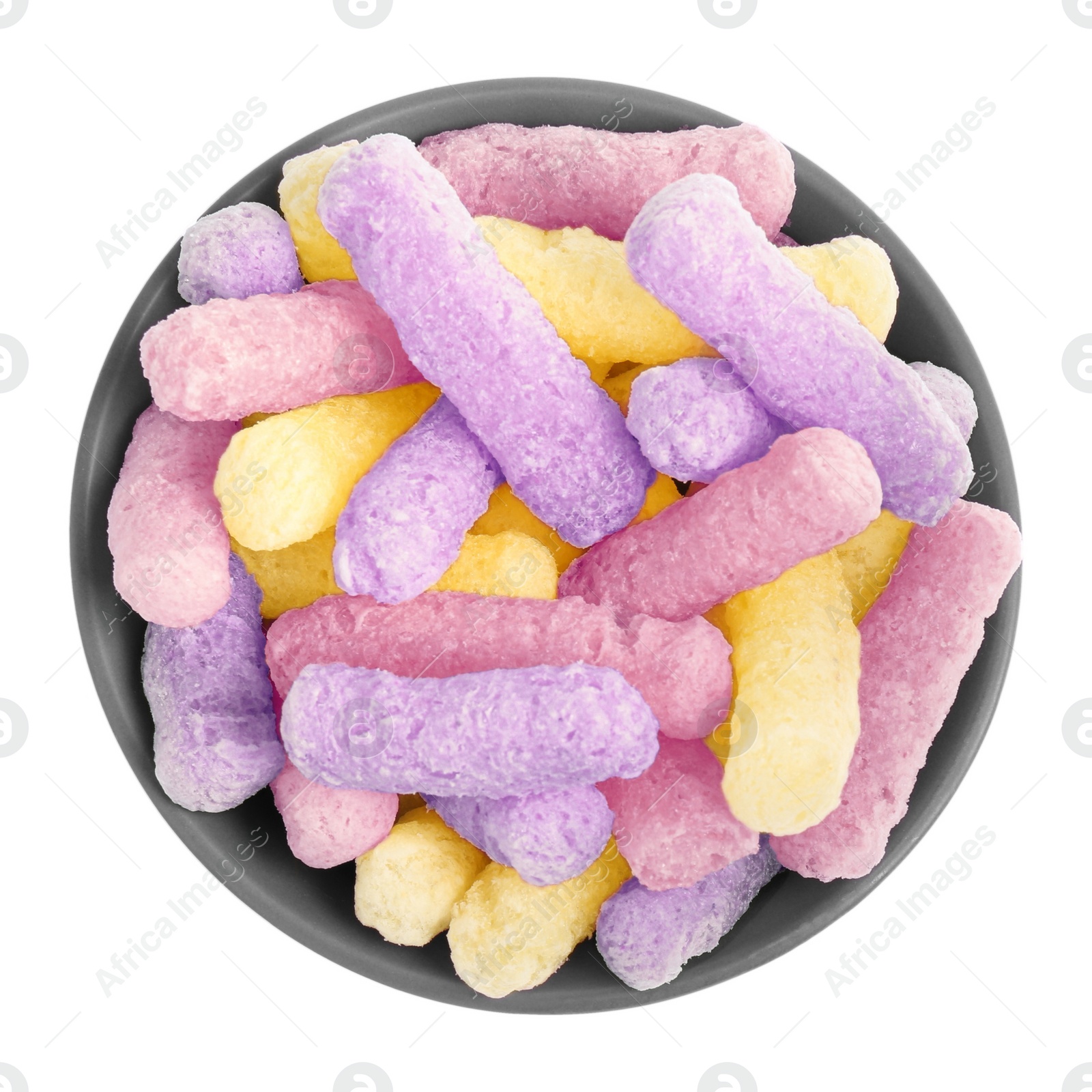 Image of Bowl with colorful corn puffs on white background, top view