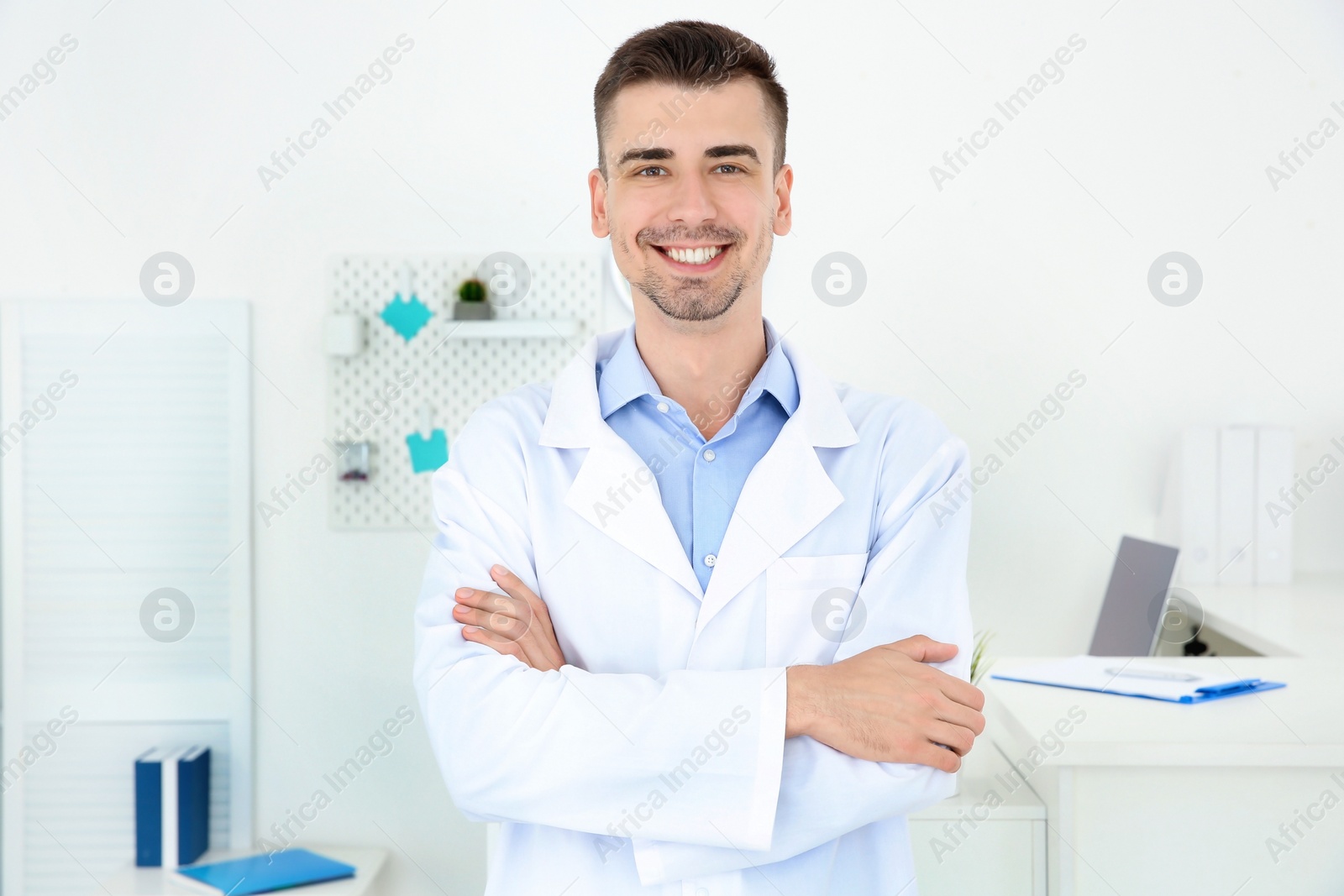 Photo of Young male receptionist working in hospital