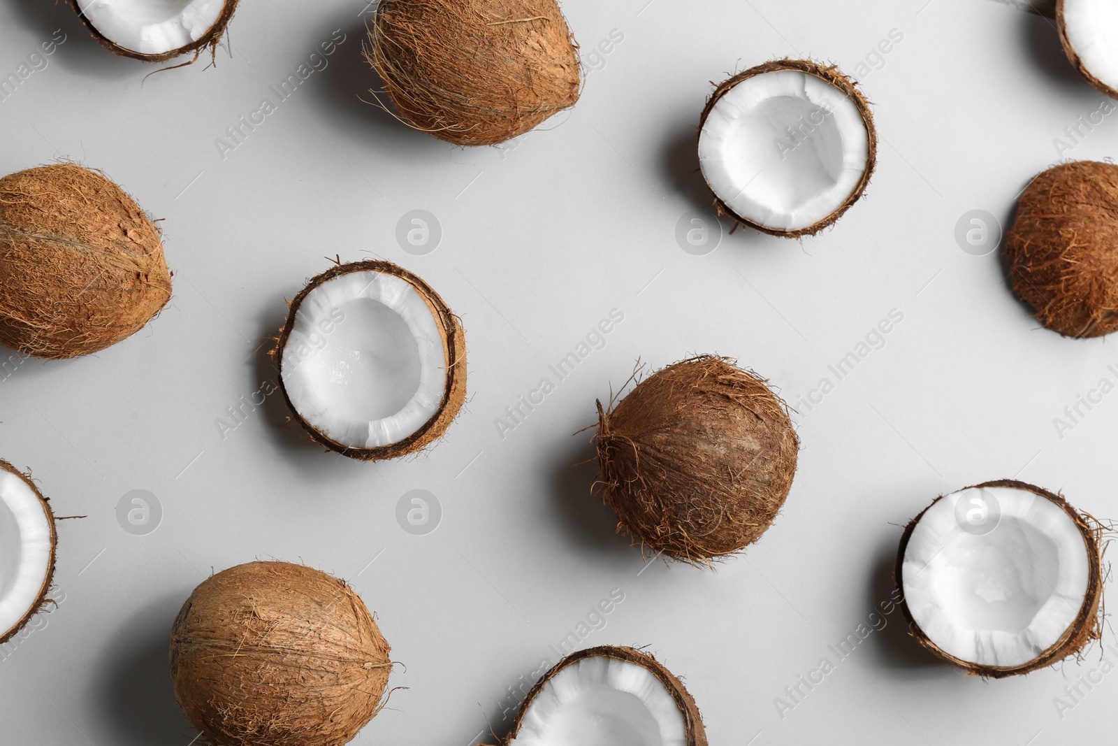 Photo of Coconut pattern on white background, top view