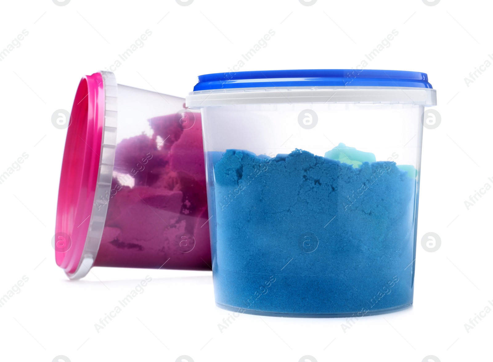 Photo of Kinetic sand and toys in buckets on white background