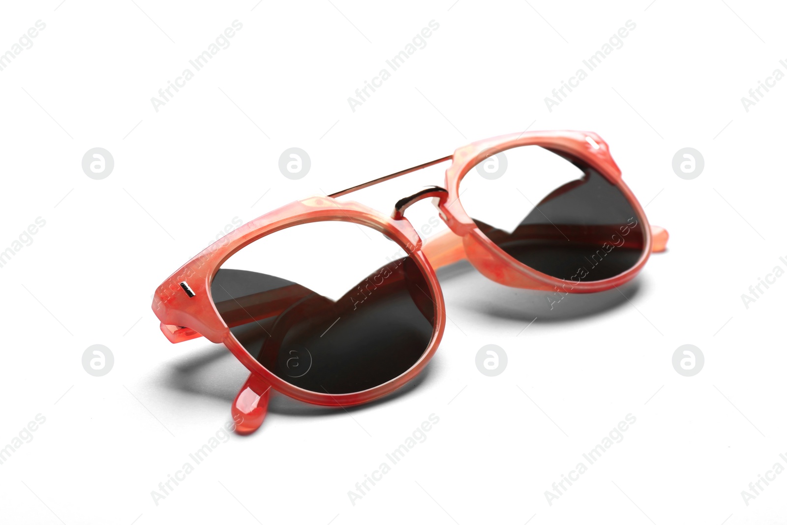 Photo of Stylish sunglasses on white background. Fashionable accessory