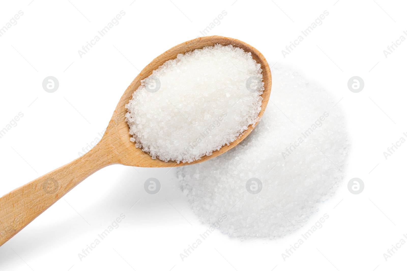 Photo of Wooden spoon and granulated sugar isolated on white, top view