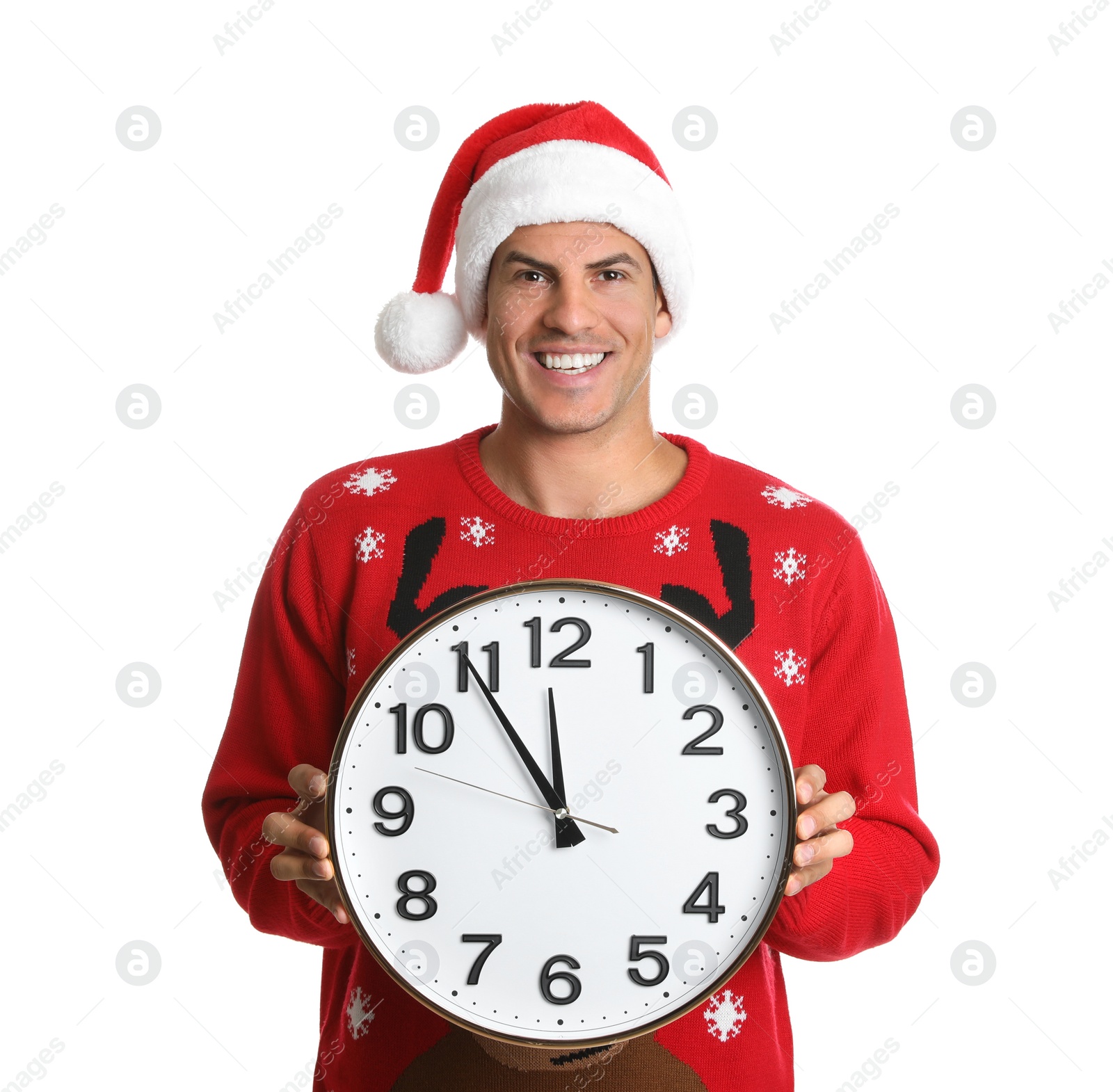 Photo of Man in Santa hat with clock on white background. New Year countdown