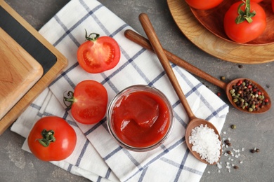 Photo of Flat lay composition with tasty homemade tomato sauce on table