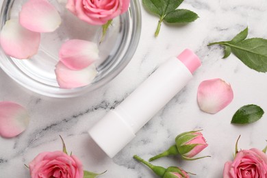 Photo of Flat lay composition with lip balm on white marble background