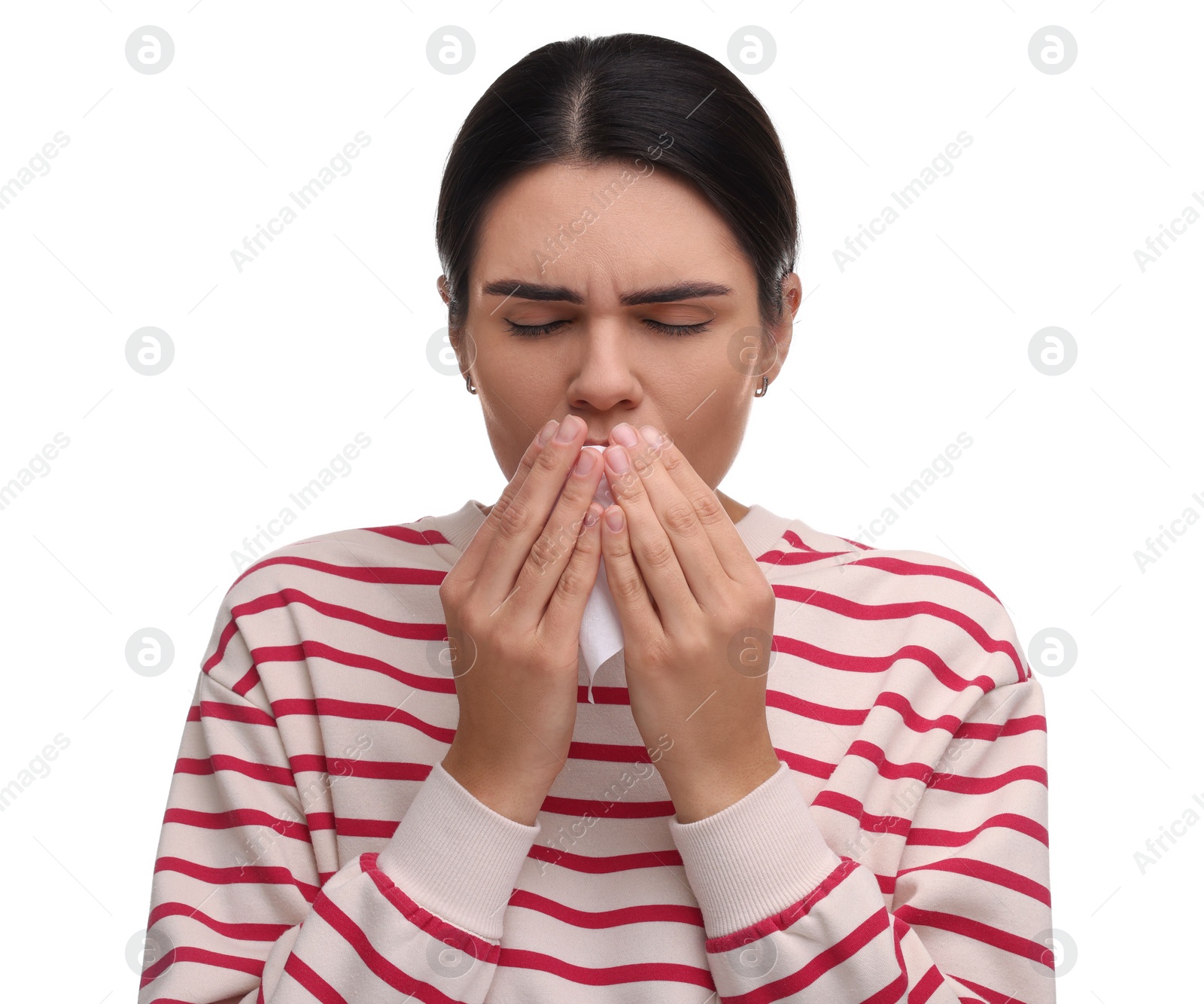 Photo of Woman with tissue coughing on white background. Cold symptoms