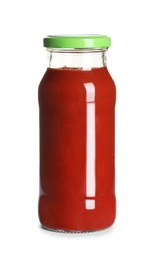 Photo of Delicious tomato sauce in glass bottle on white background
