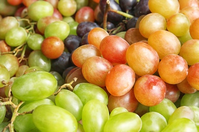 Fresh ripe juicy grapes as background, closeup