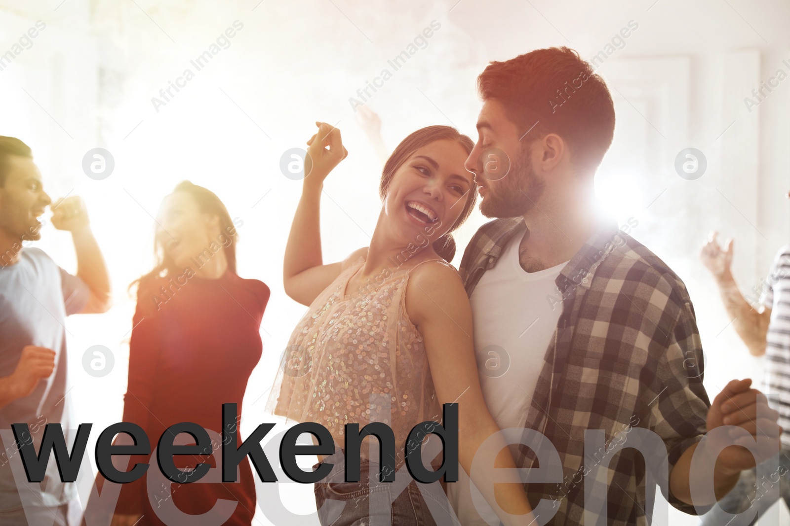 Image of Hello Weekend. Lovely young couple dancing together at party