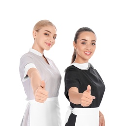 Portrait of young chambermaids on white background