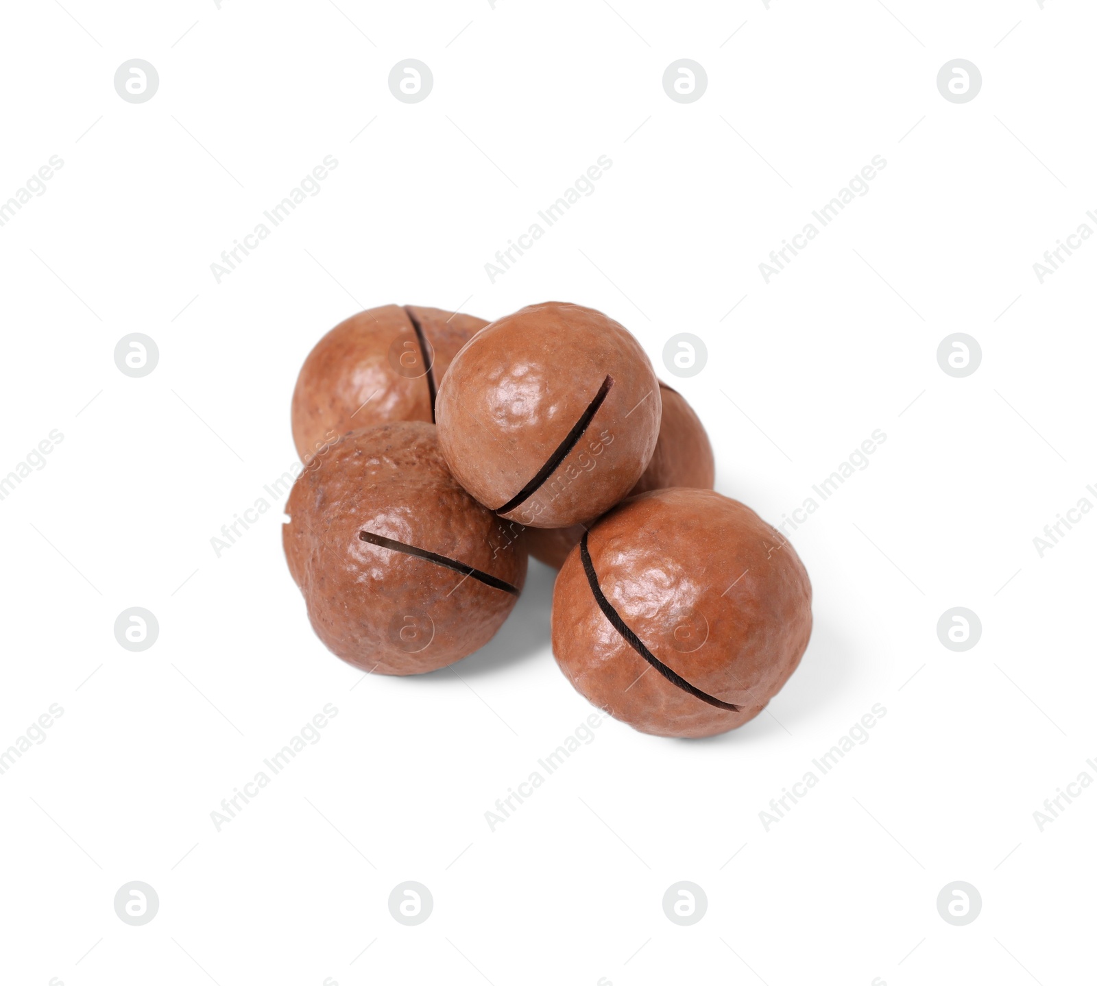 Photo of Delicious organic Macadamia nuts isolated on white