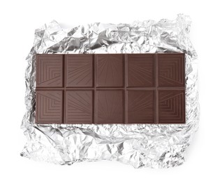 Delicious dark chocolate bar with foil isolated on white, top view
