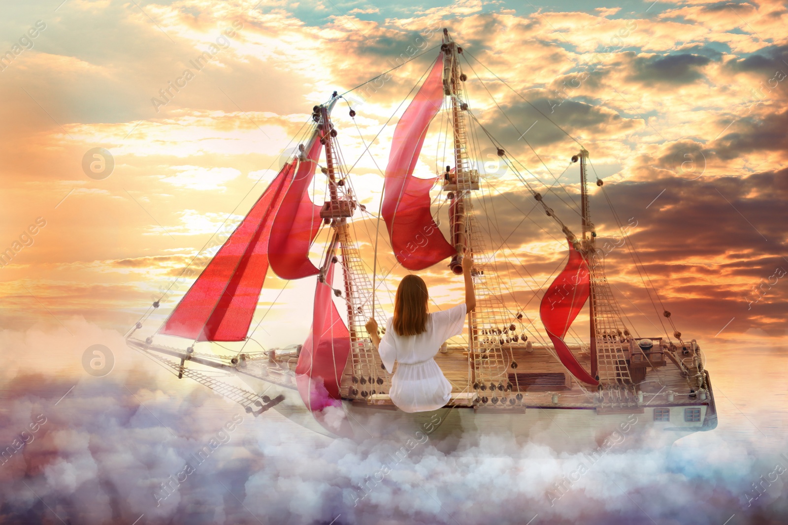 Image of Dream world. Sailing ship with beautiful girl on board floating among wonderful fluffy clouds