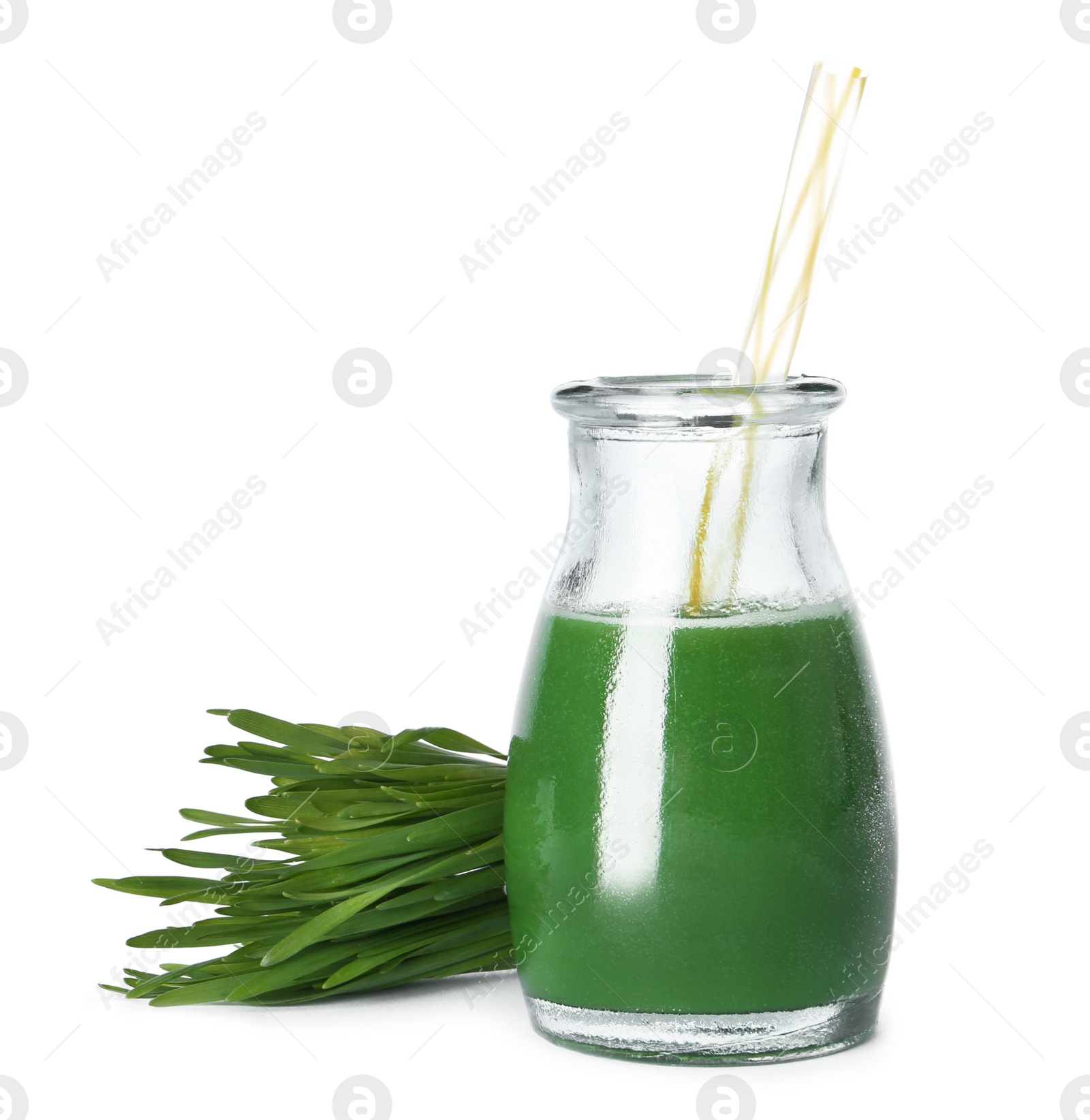 Bottle of wheat grass juice and sprouts on white background Photo of Bottle of wheat grass juice and sprouts on white background