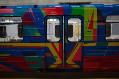 Photo of Train on modern subway station. Public transport