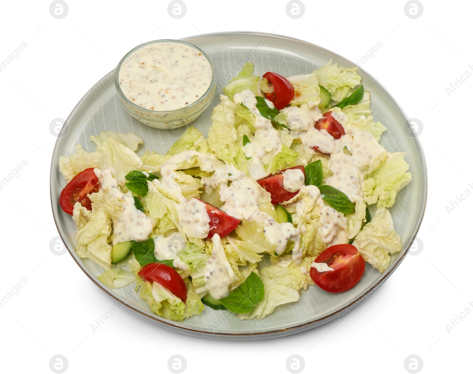 Photo of Delicious salad with Chinese cabbage, tomatoes, cucumber and dressing isolated on white, above view