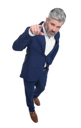 Mature businessman in stylish clothes posing on white background, above view