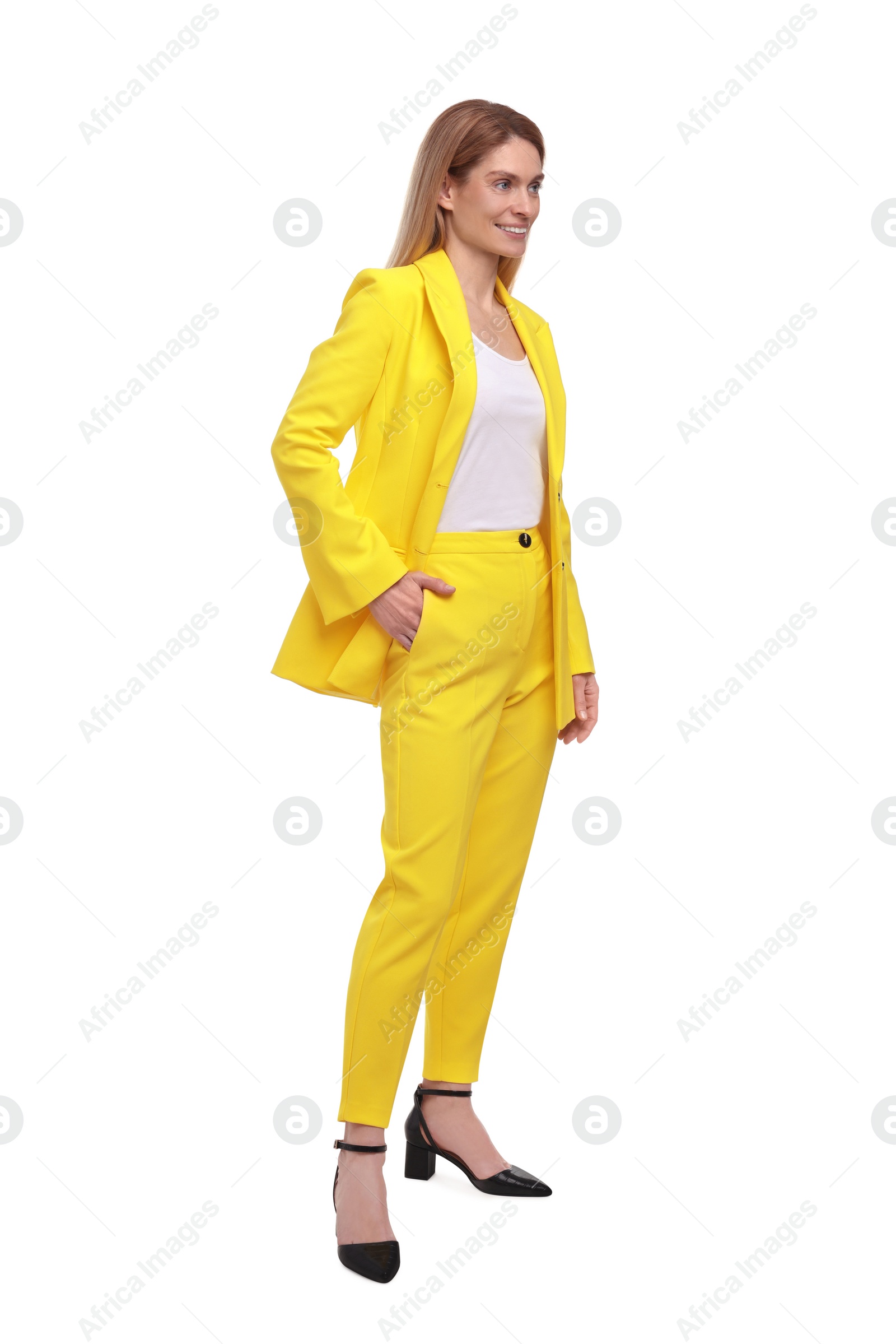 Photo of Beautiful happy businesswoman posing on white background