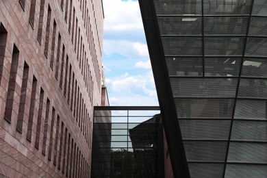 Photo of Exterior of modern buildings in city, low angle view