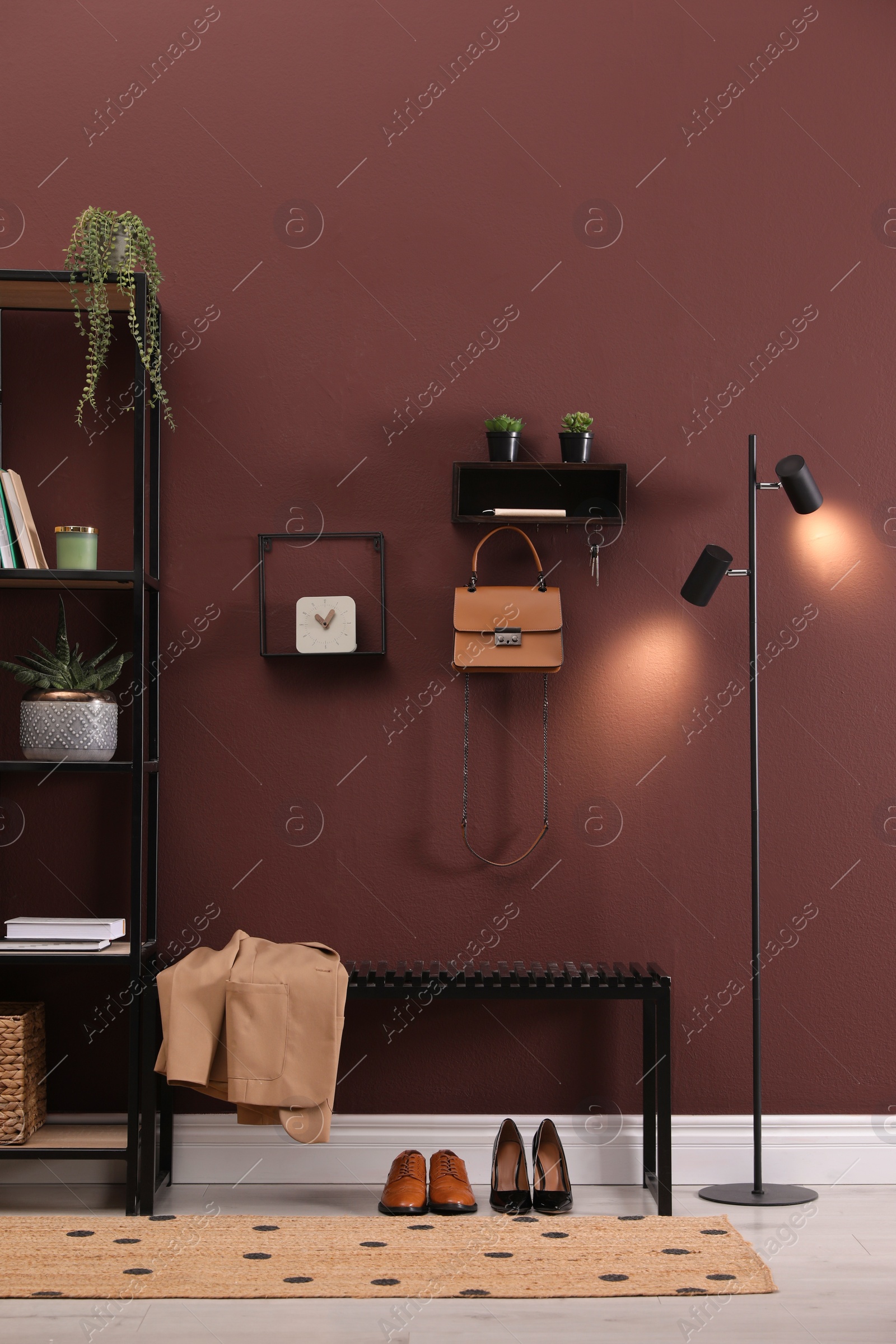 Photo of Modern hallway interior with stylish furniture and key holder