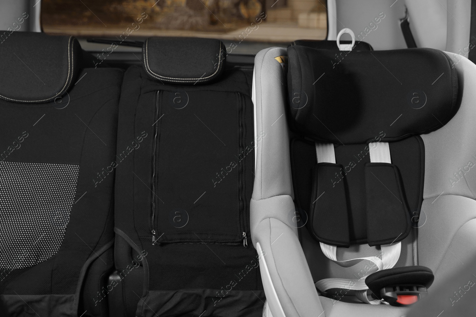 Photo of Empty baby seat inside car. Child safety