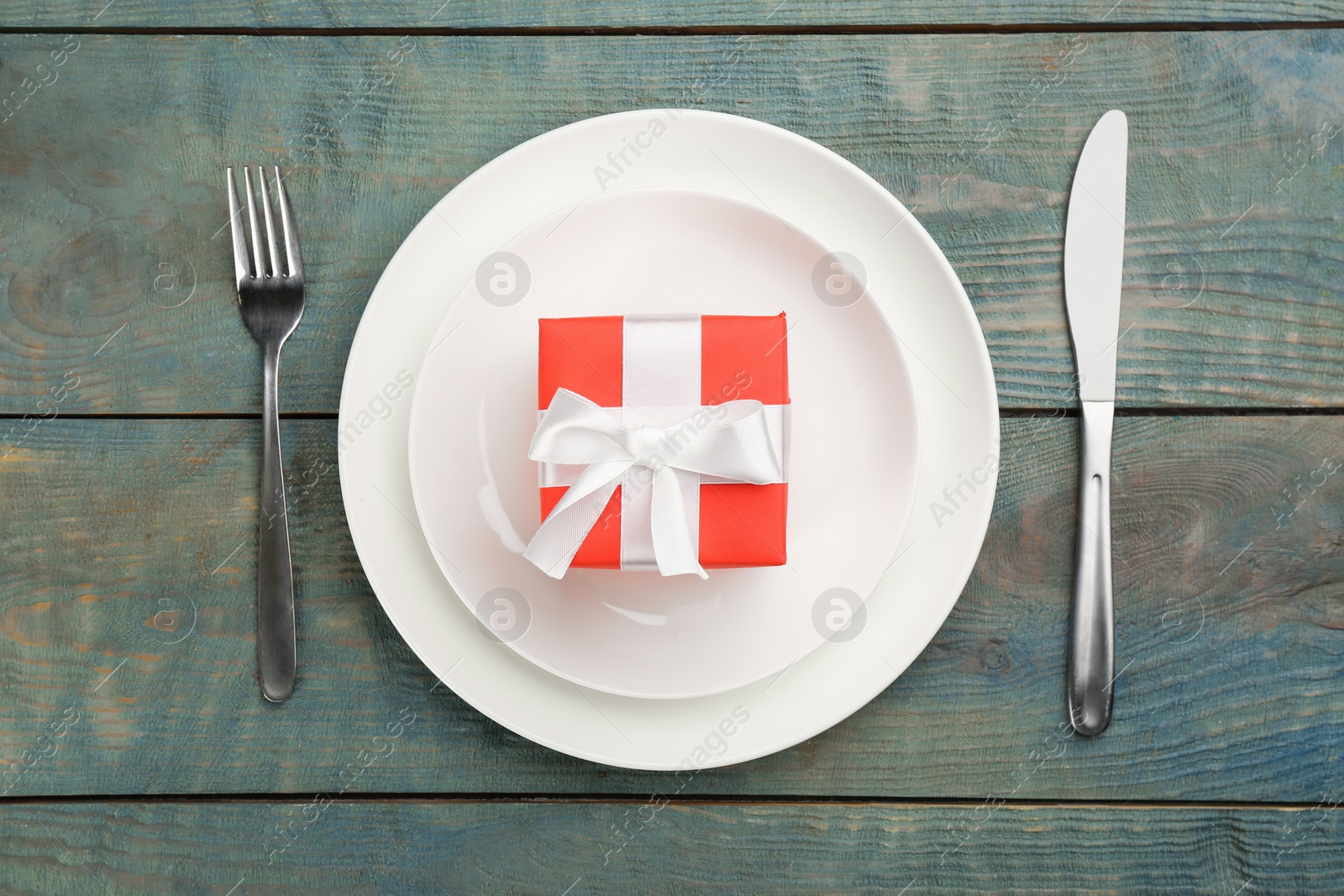 Photo of Beautiful table setting on wooden background, flat lay. Valentine's Day dinner