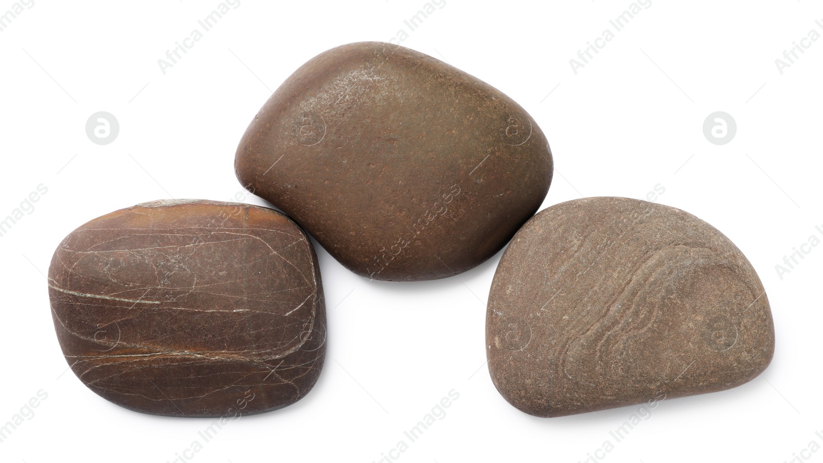 Photo of Group of different stones on white background, top view