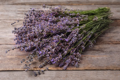 Beautiful blooming lavender flowers on wooden table