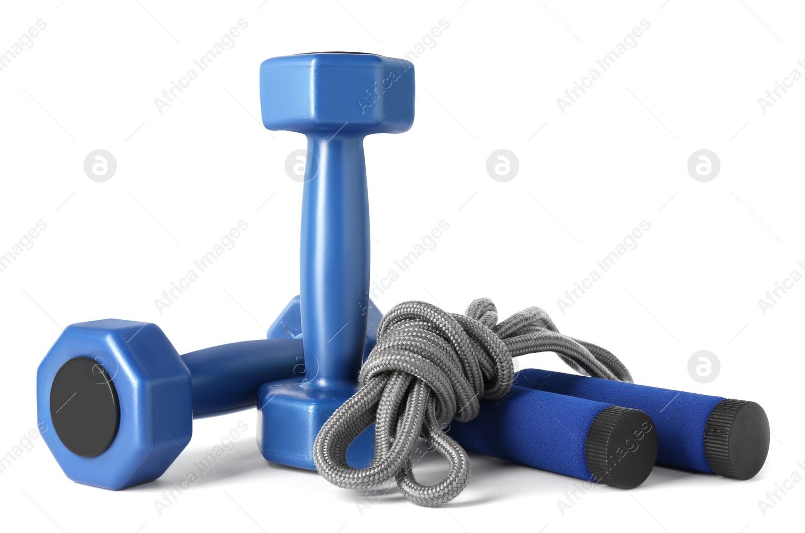 Photo of Dumbbells and skipping rope isolated on white