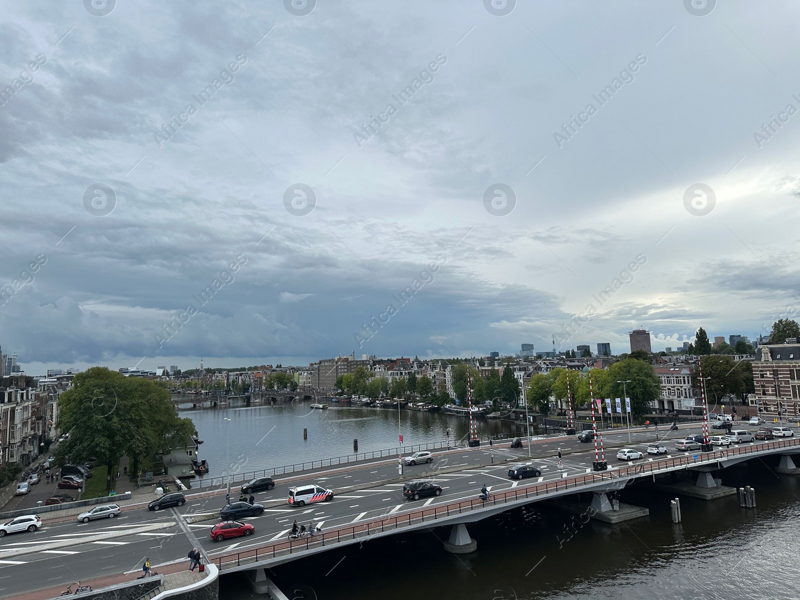 Photo of Amterdam, Netherlands - September 22, 2023: Beautiful view on city under cloudy sky