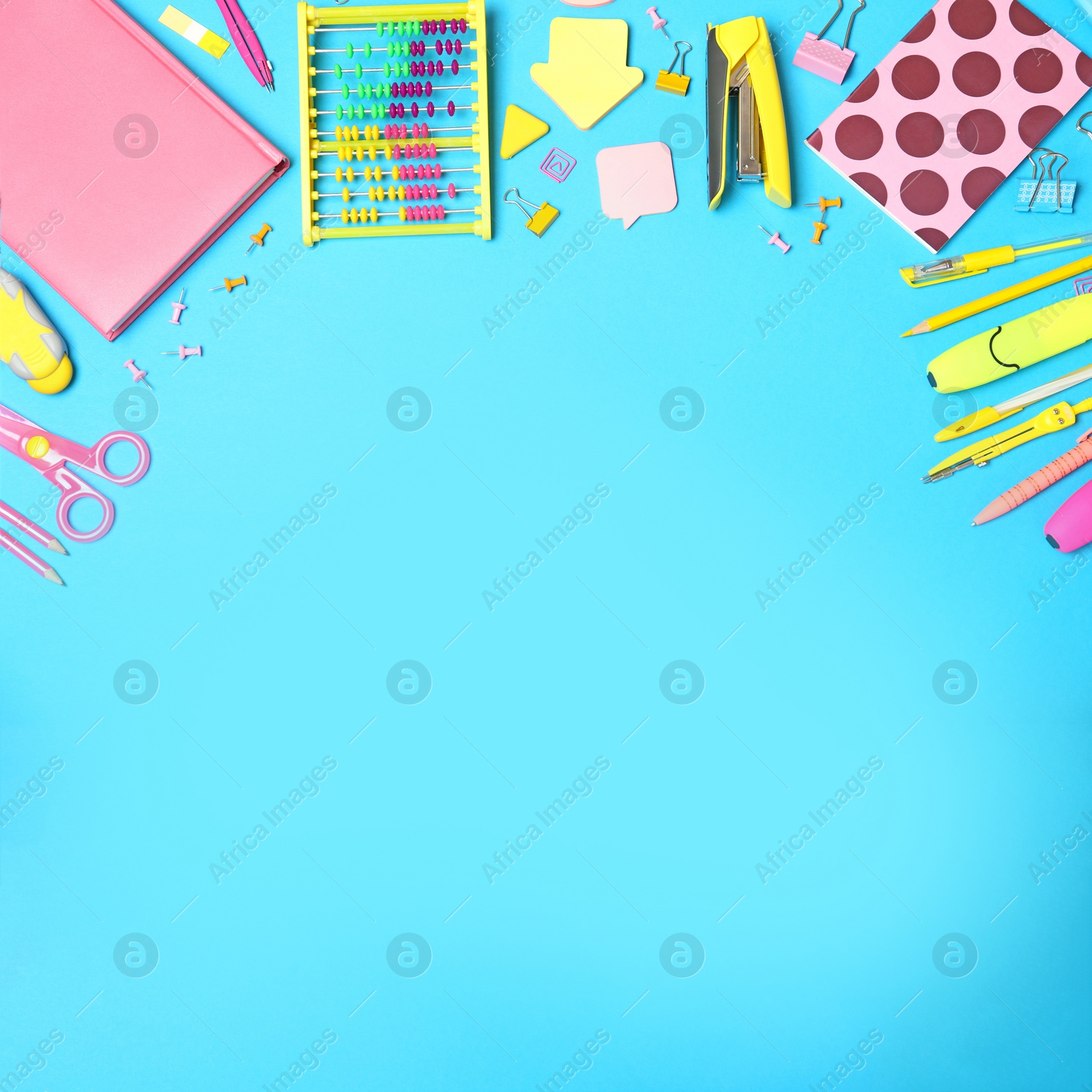 Image of Flat lay composition with different school stationery on light blue background. Space for text